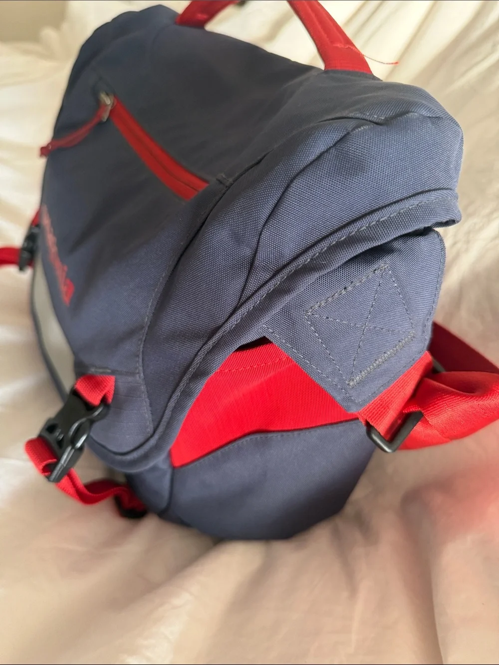 Rare almost new Patagonia gray and Red mini messenger Bag with Reflective Panel
